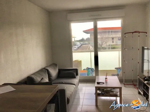 Appartement type T2 de 34.55 m2 comprenant , un hall d'entrée