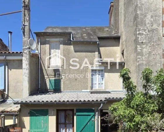 Maison de ville avec jardin et dépendance