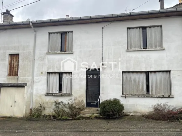Maison de village à fort potentiel au coeur de DOMGERMAIN