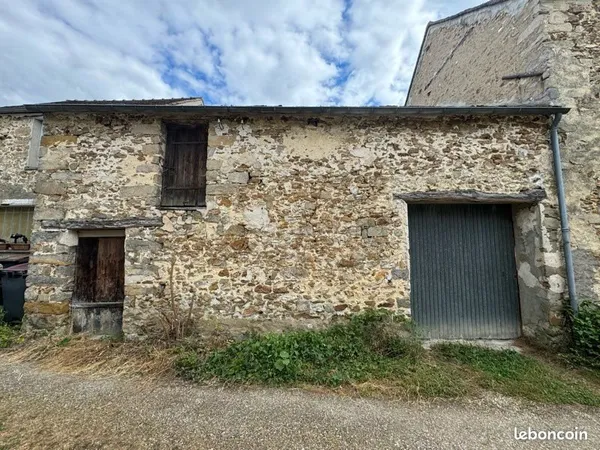 Grange habitable 67m2 + terrain 274m2 clos de mur