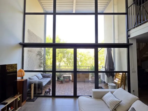 Appartement en duplex avec terrasse et parkings privatives