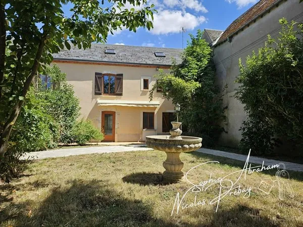 Maison en pierre avec jardin et double garage ? Proche centre-ville