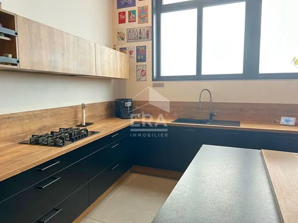 Appartement type loft 160 m² en résidence sécurisée