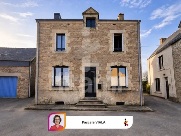 Maison en pierre avec jardin