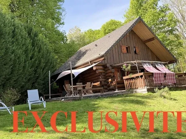 Superbe chalet en rondins au coeur d'un écrin de verdure