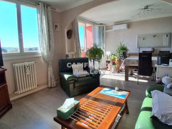 Appartement 3 pièces 66 m² avec balcon, cave et parking