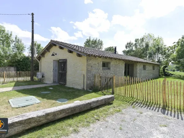 Maison plain pied en pierre 101m² Le Bourdet