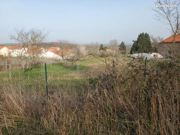 Terrain cloturé et bien situé