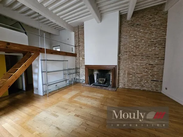APPARTEMENT STYLE LOFT AVEC TERRASSE DANS UN BEL IMMEUBLE AN
