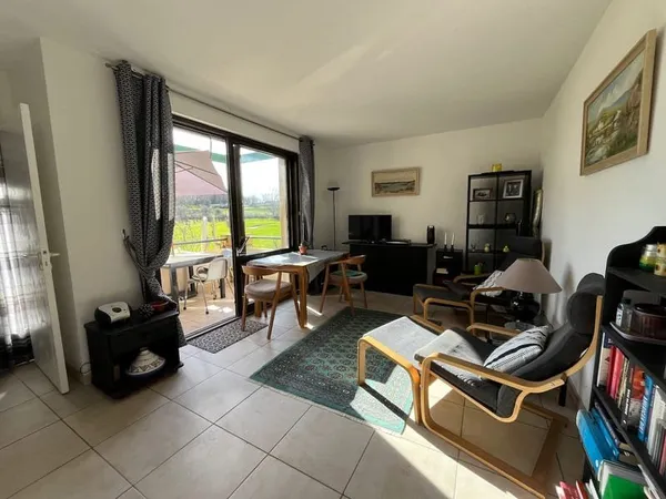 Bénéficiant d'un cadre exceptionnel sur le site du Golf de Villeneuve-sur-Lot, cet appartement très 