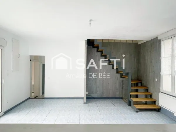 Maison de caractère avec jardin et local professionnel Laleu