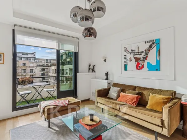 Appartement avec terrasse au coeur du 16e