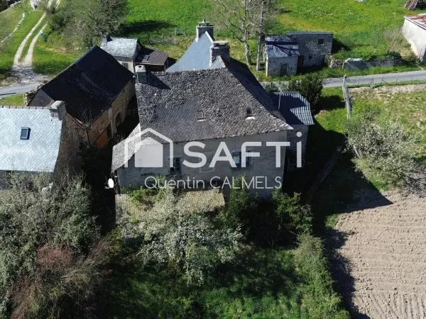 Maison en pierre avec grange et vue exceptionnelle - Taulamet (près de Sénergues)
