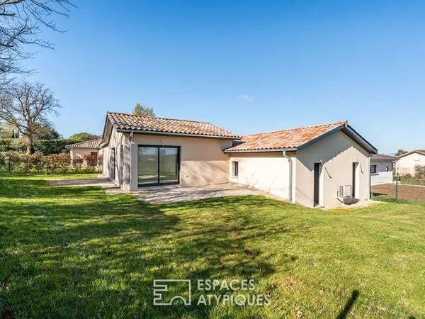 Maison neuve avec jardin et garage