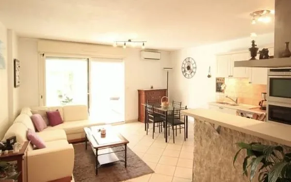 EXCEPTIONNEL : Appartement Rez-de-jardin au Centre Ville+GARAGE