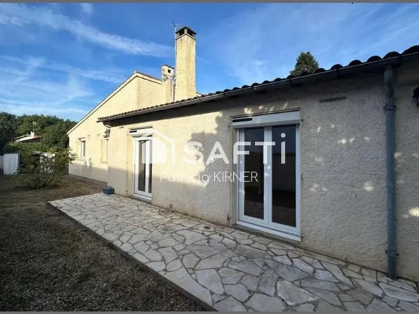 Maison plain pied T5 avec garage et jardin.