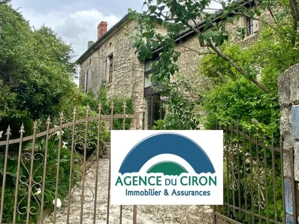 Demeure en pierre de 270 m2 avec jardin et dépendances