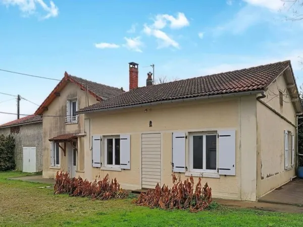 2 maisons habitables + grange sur terrain de 1200m2