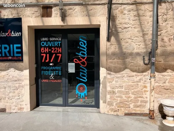 Laverie + murs à vendre - activité clé en main - potentiel de développement