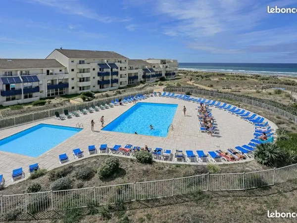 Plage : T 3 bord de mer avec piscine