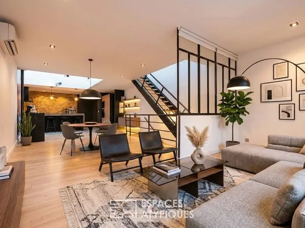 Épure contemporaine et âme de village pour cette maison coeur de ville
