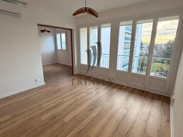 Appartement rénové de 75 m2 avec balcon, cave et garage