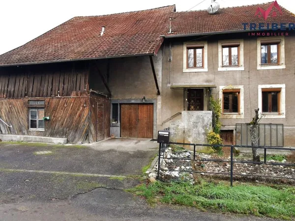 Maison Bourogne type ferme sur 522 m2 de terrain avec garage