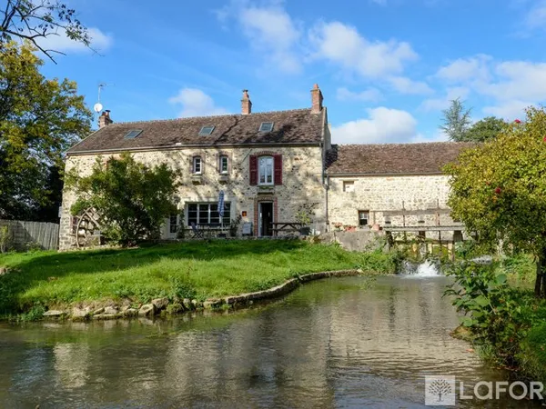 Maison 7 pièces 240 m²