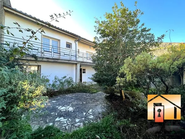Vente maison de village avec jardin et garage - PUYMIROL