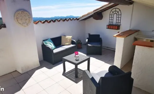 Maison de village avec terrasse de toit et cave en rez-de-rue