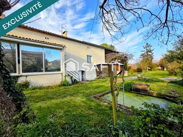 Maison en pierre autonome en énergie !! Garage, dépendances, jardin ! Parcelle constructible à reven