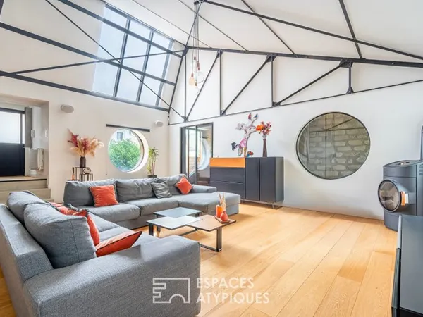 Loft avec verrière zénithale dans une ancienne cartonnerie réhabilitée