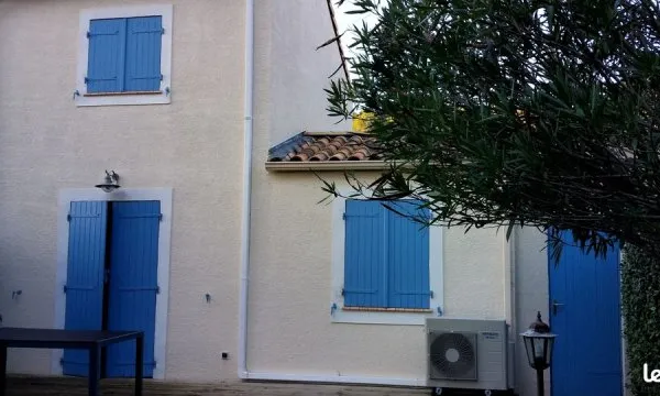 Maison parking (piscine collective)