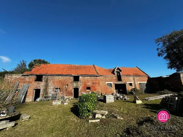Terrain constructible avec grange