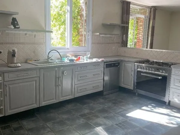 Maison 10 pièces 466 m²
