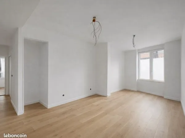 Appartement - neuf - terrasse - parking - RDC