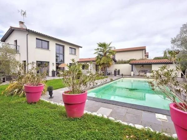 Maison 8 pièces 210 m²