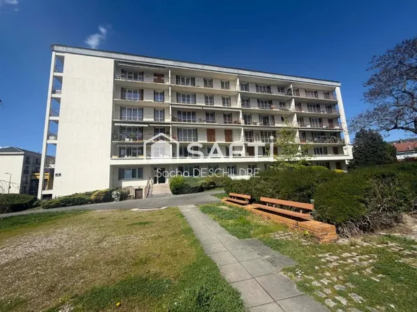 Appartement avec balcon, cave et stationnement - Saint-Remi