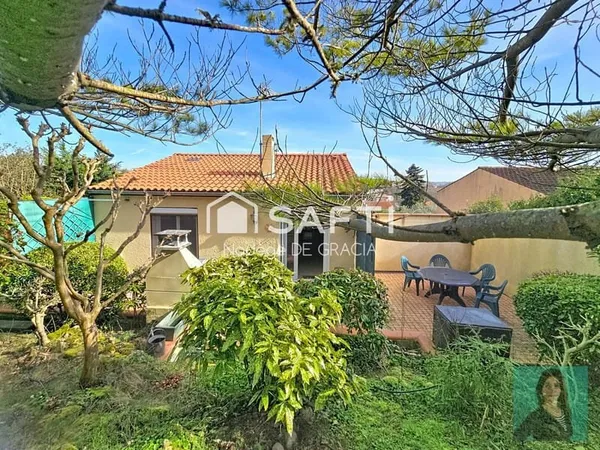 Maison duplex T3/4 avec 2 garages plein centre au calme vue dégagée