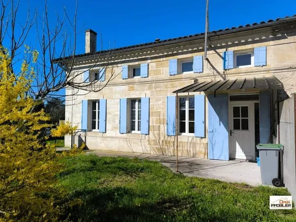 Maison en pierre proche collège
