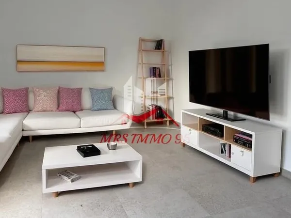 Appartement rénové rez de jardin, de 23,2 m2 avec parking