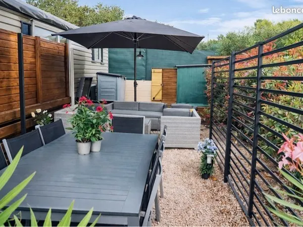 Mobil home climatisé 3 chambres + terrasse fermée et jardin