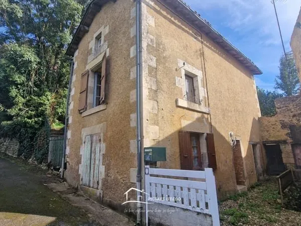 Maison à rénover avec grange et terrain - Fort potentiel à L