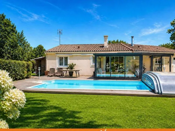 Maison contemporaine véranda et piscine environnement privilégié