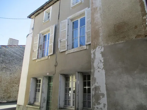 Ensemble immobilier de deux maisons communicantes.