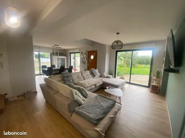 Maison familiale chaleureuse avec jardin - cadre paisible et charme assuré