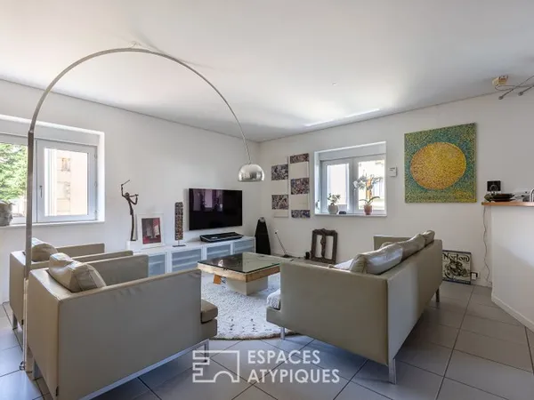 Appartement-maison indépendante avec terrasse, garage et atelier