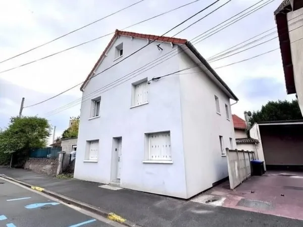 Bâtiment 209 m²
