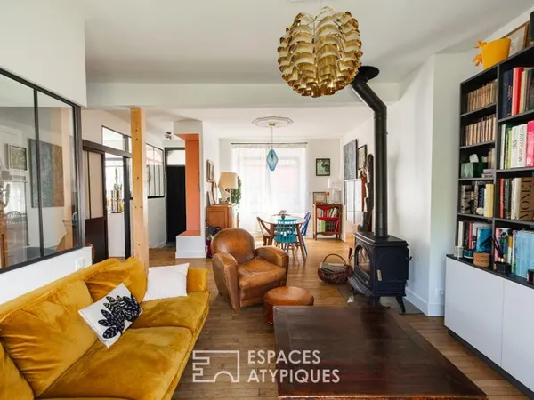 Maison de ville rénovée, volumes traversants et jardin paysagé