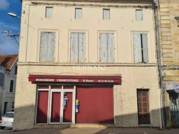 Ensemble immobilier composé d'une Boucherie et un appartemen
